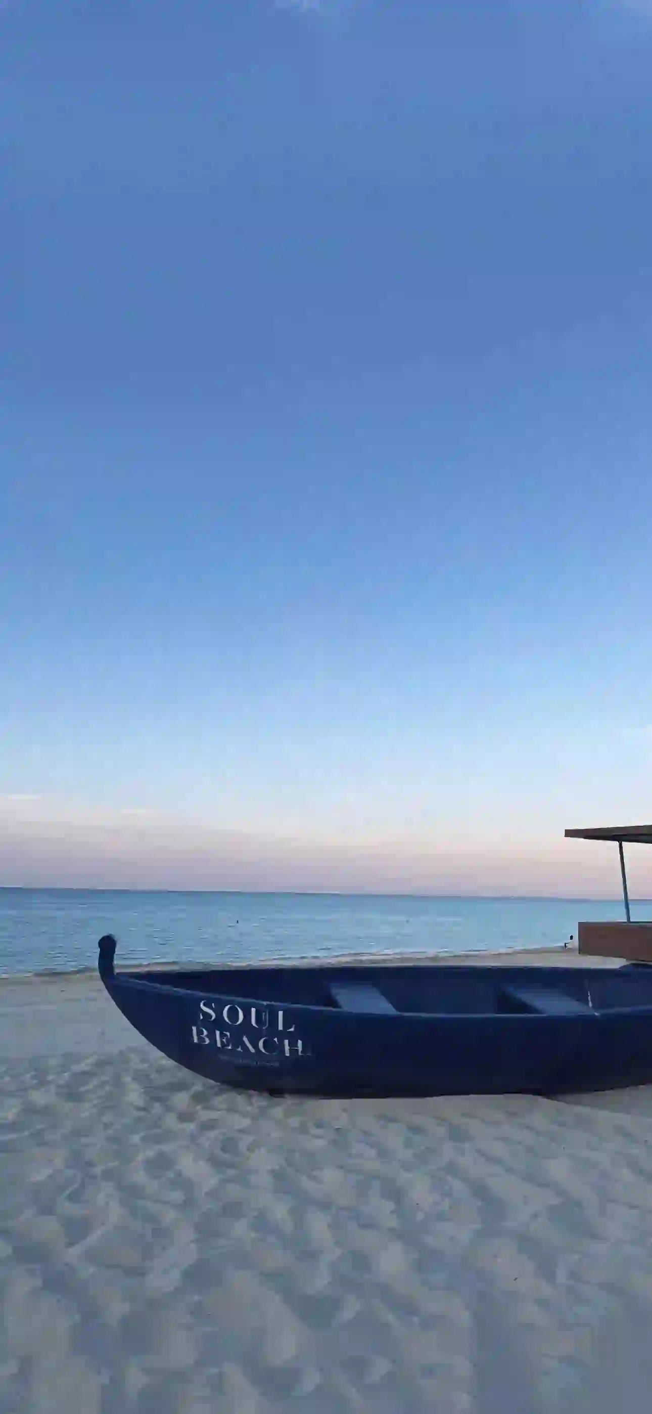 风景 海浪 蓝天 小船 沙滩