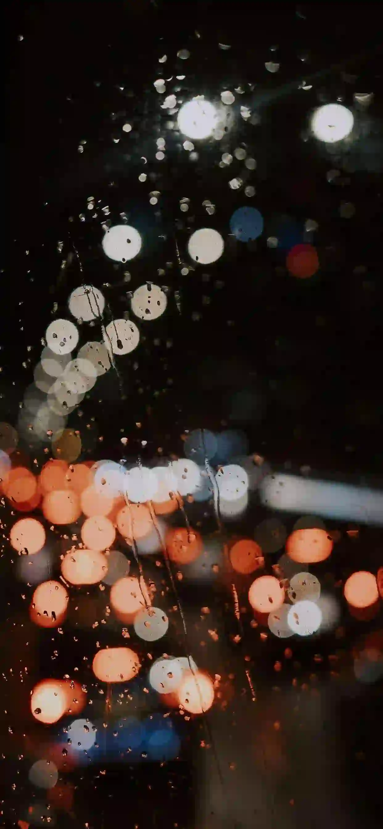 雨滴 霓虹灯光 玻璃