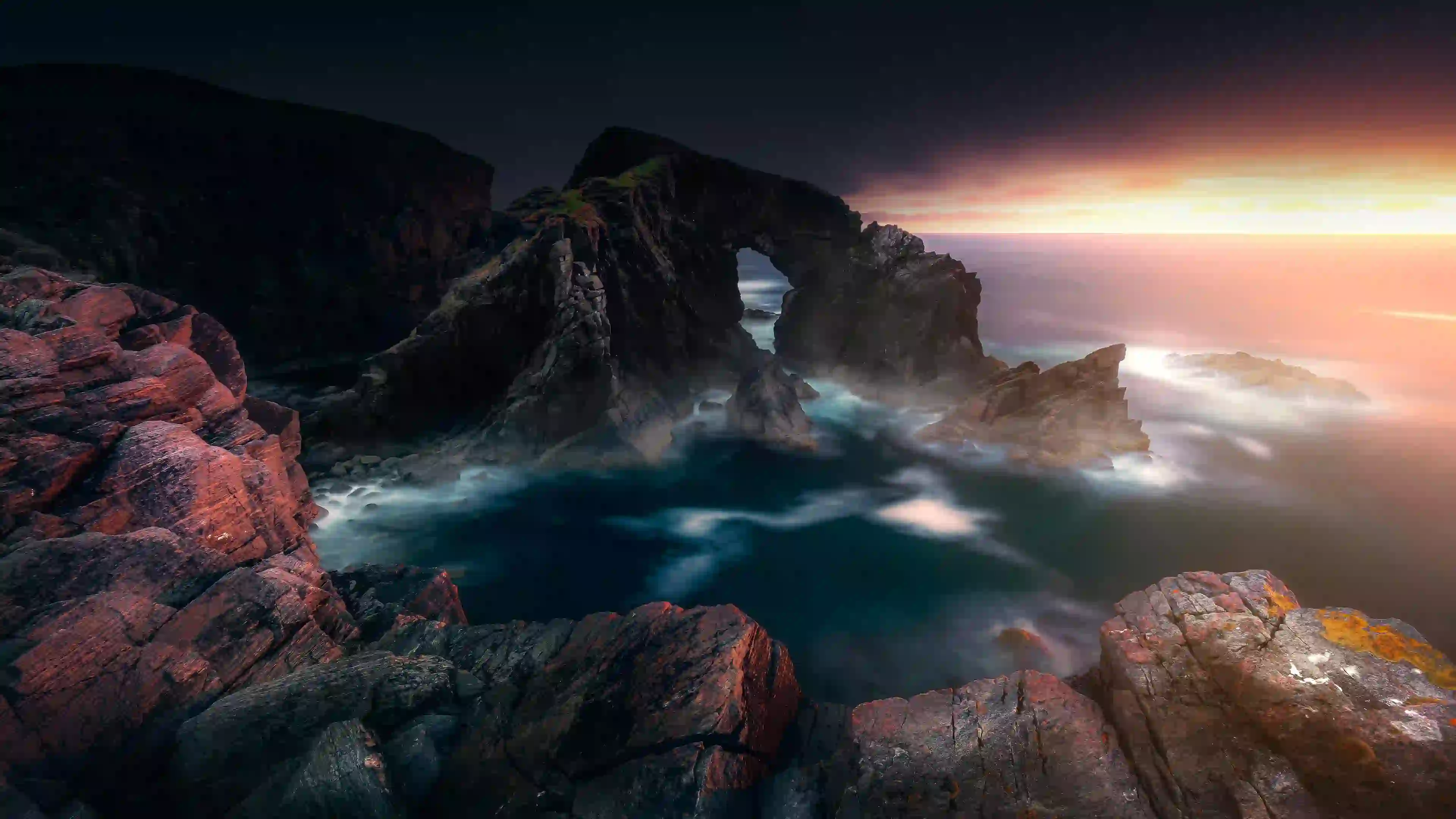 海 礁石 海水 光 傍晚